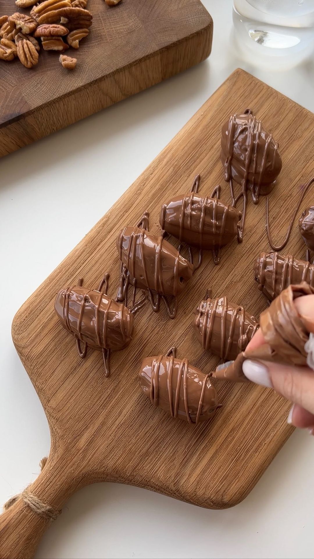Chocolate Covered Dates with Strawberry-Banana-Nut Filling!
