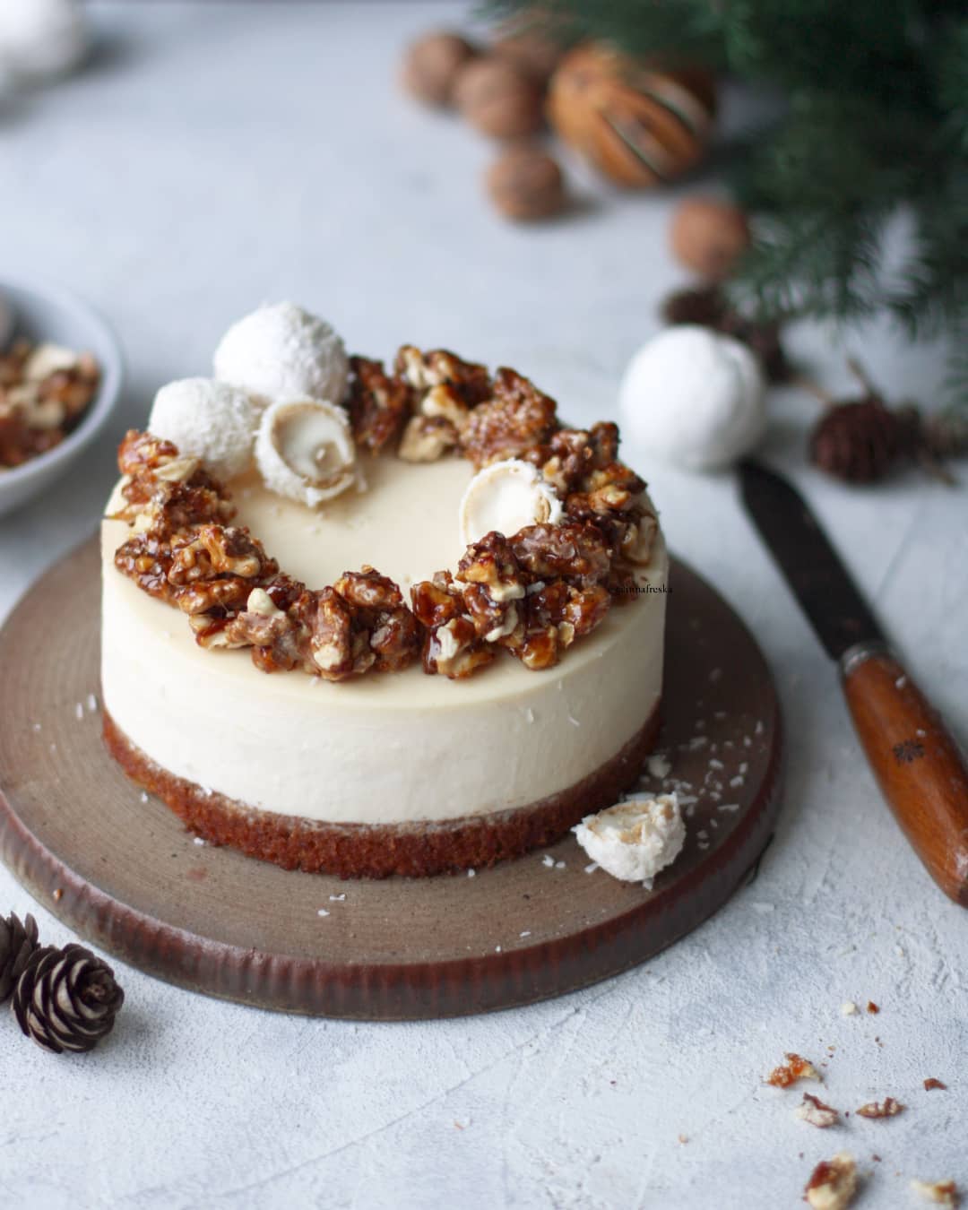Winter coconut cheesecake with candied walnuts